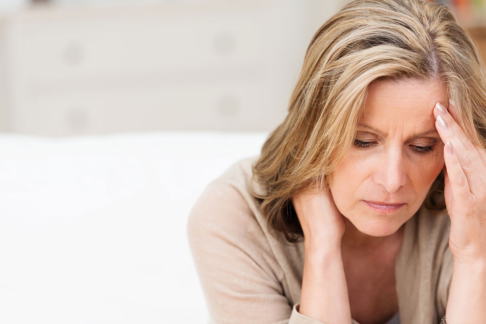 woman looking concerned - are you an enabler - no more enabling - signs you are enabling your loved one's addiction